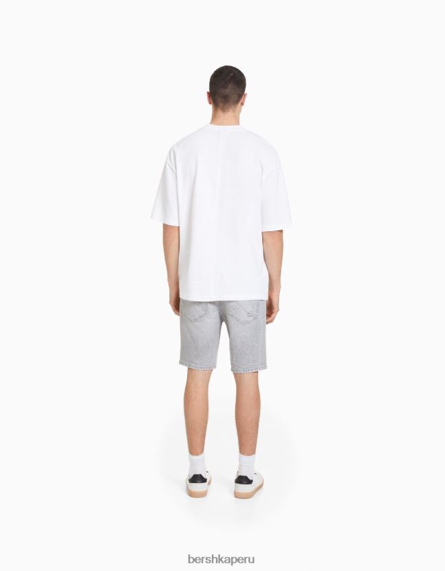 gris oscuro Bershka hombres bermudas de mezclilla con rotos 806J6B3343