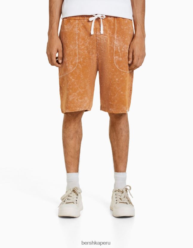 naranja oscuro Bershka hombres bermudas de algodón con efecto desteñido 806J6B3313