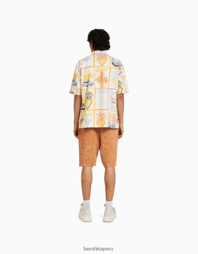 naranja oscuro Bershka hombres bermudas de algodón con efecto desteñido 806J6B3313
