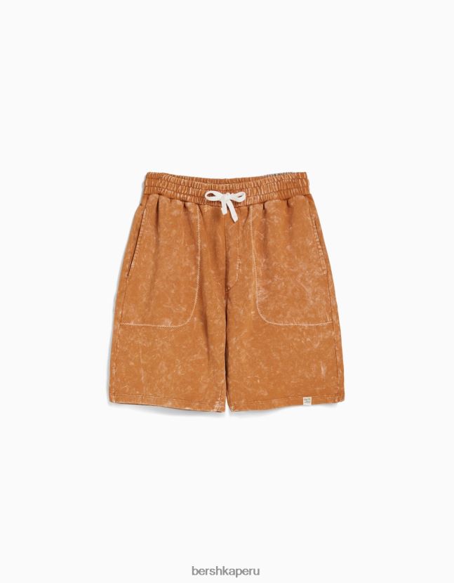 naranja oscuro Bershka hombres bermudas de algodón con efecto desteñido 806J6B3313
