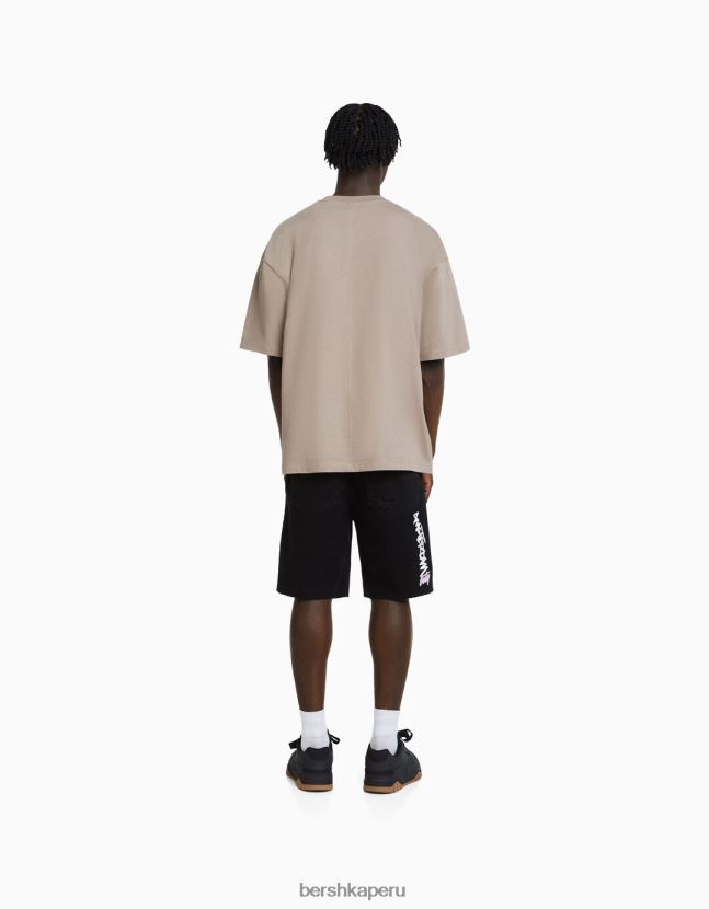 negro Bershka hombres bermudas de mezclilla con rotos estampados 806J6B3334