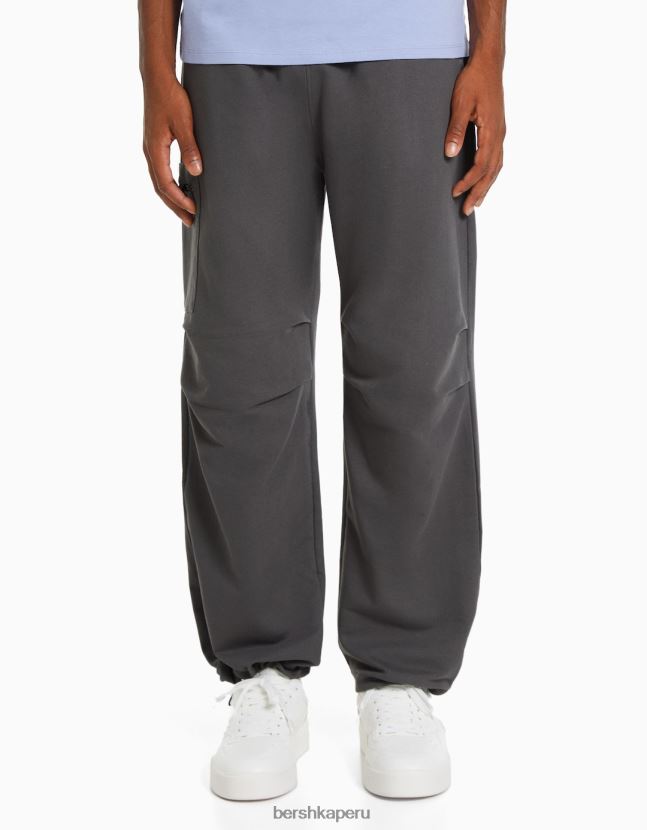 gris Bershka hombres pantalones de paracaídas de felpa con bolsillos con cremallera 806J6B3234