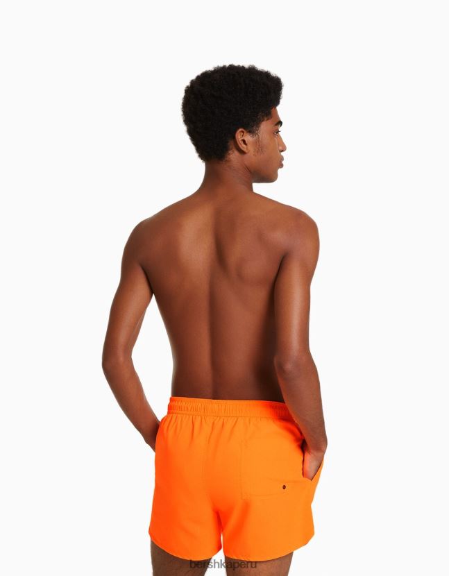 naranja Bershka hombres shorts de playa básicos de neón 806J6B3391