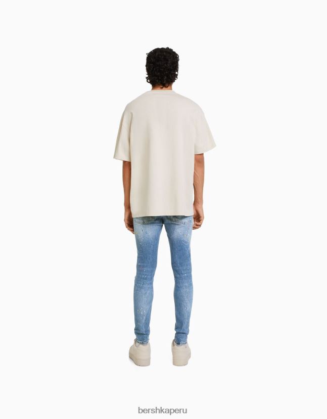 azul Bershka hombres skinny jeans rotos con salpicaduras de pintura 806J6B3172