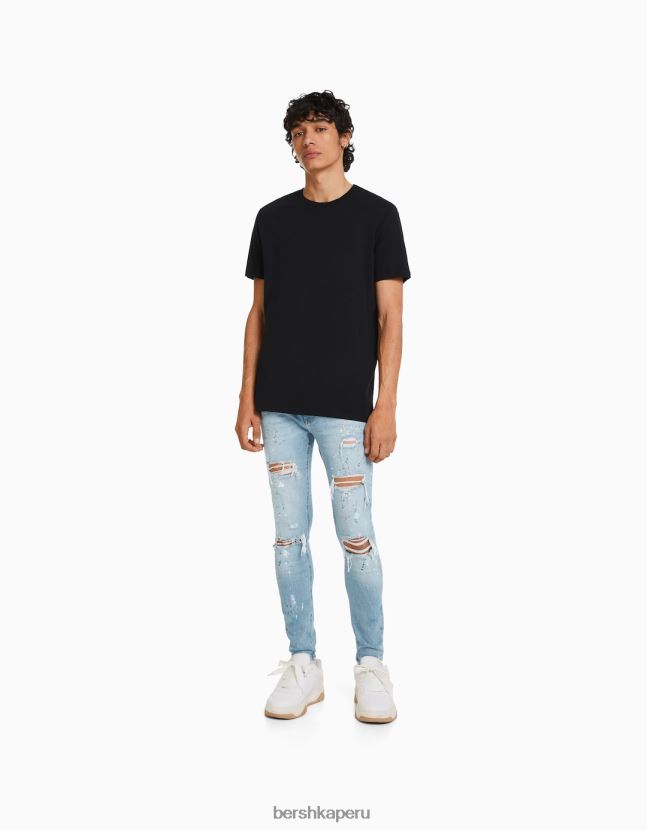 azul claro Bershka hombres skinny jeans rotos con salpicaduras de pintura 806J6B3170