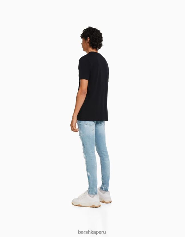 azul claro Bershka hombres skinny jeans rotos con salpicaduras de pintura 806J6B3170