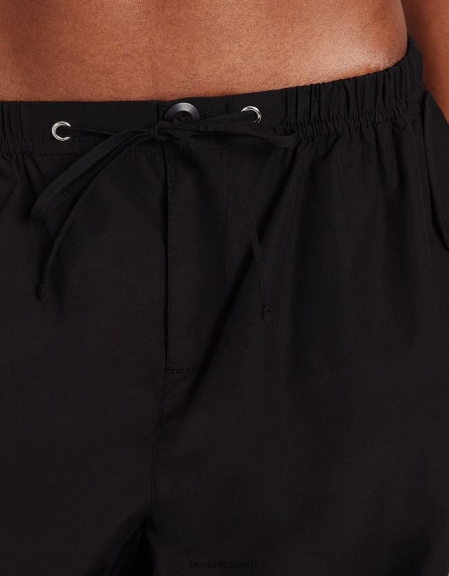 negro Bershka mujer pantalones de chándal tipo paracaídas de nailon sintético 806J6B1310
